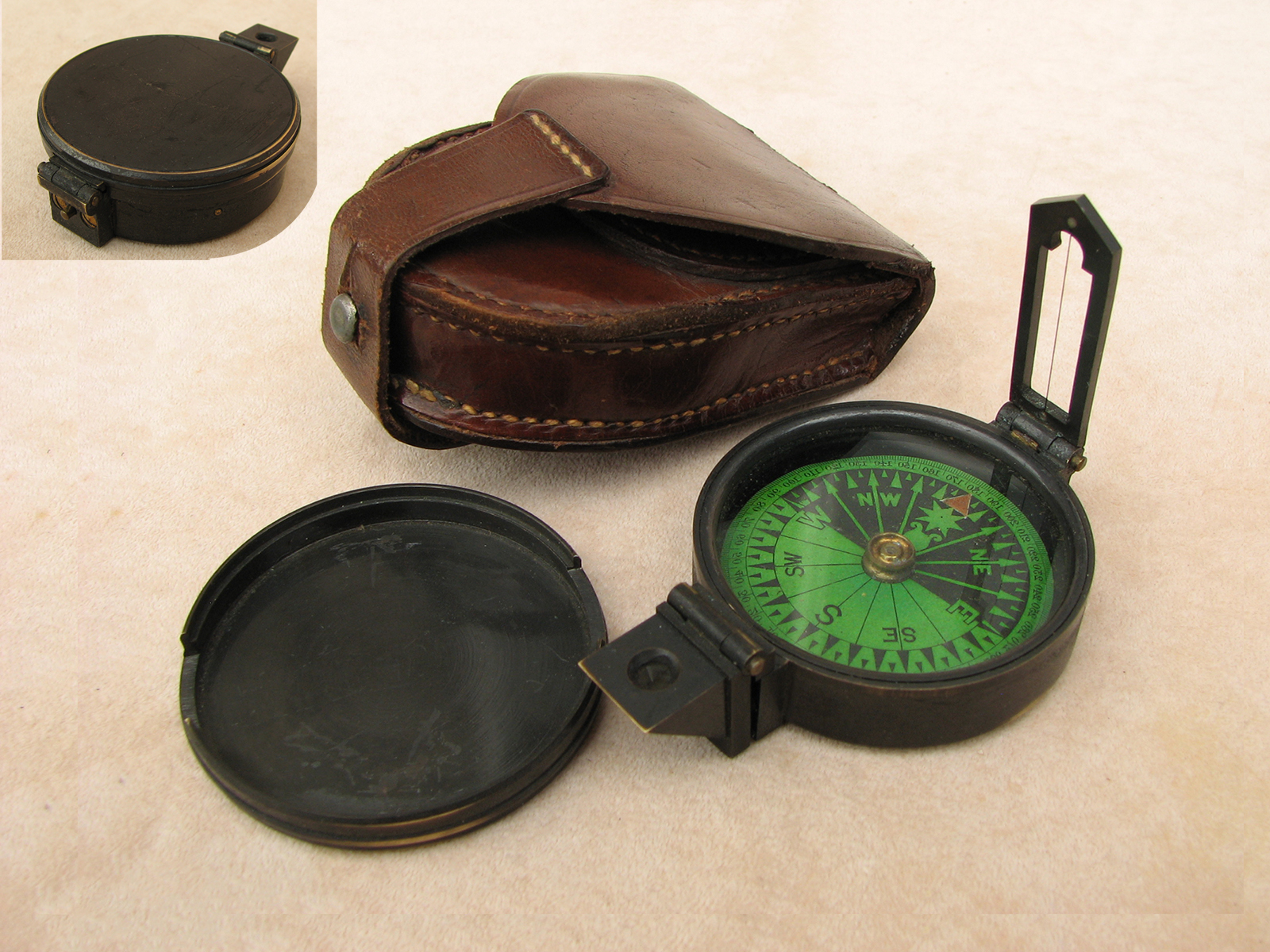 Rare prismatic compass with Singers Patent green card dial